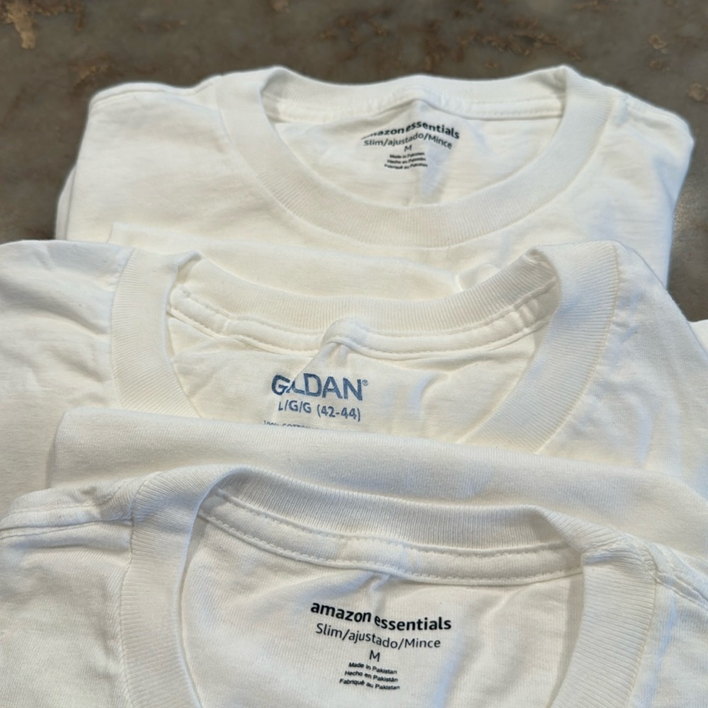 3 white t-shirts varying sizes,NEVER WORN